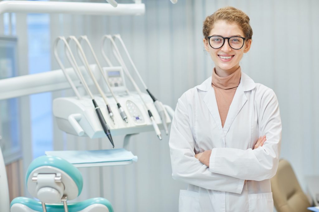 Dentist at dental clinic